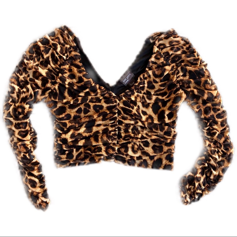 Cheetah print crop top. Tight fit, but stretchy.